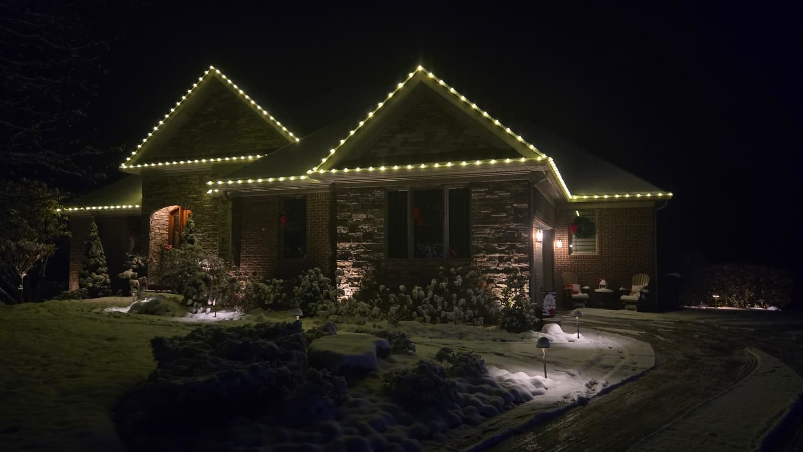 Southern Indiana home with a custom Christmas light roofline design by Elite Exteriors